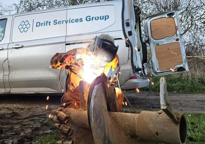 Drift specialist fixing a drill bit in situ